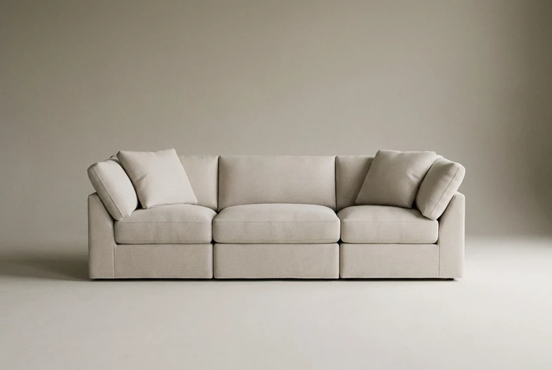 The Sundays Get Together 3-Piece Modular Sofa in Clay, styled against a deep taupe wall in a bright, minimally furnished living room