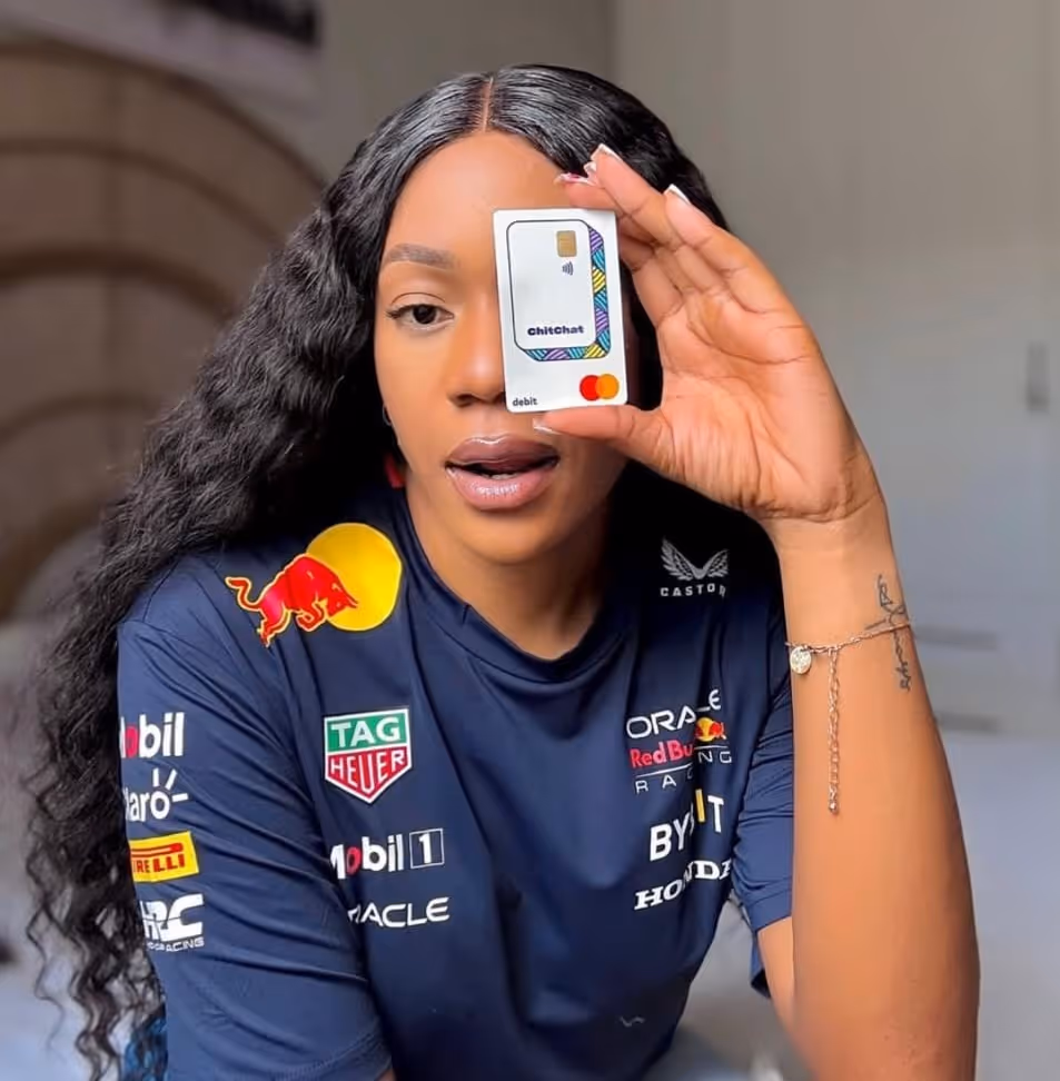 Woman holding the ChitChat card