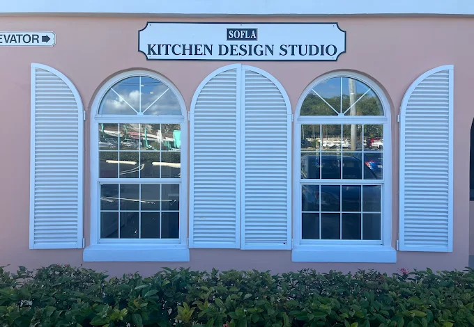 Art on wall with kitchen in background