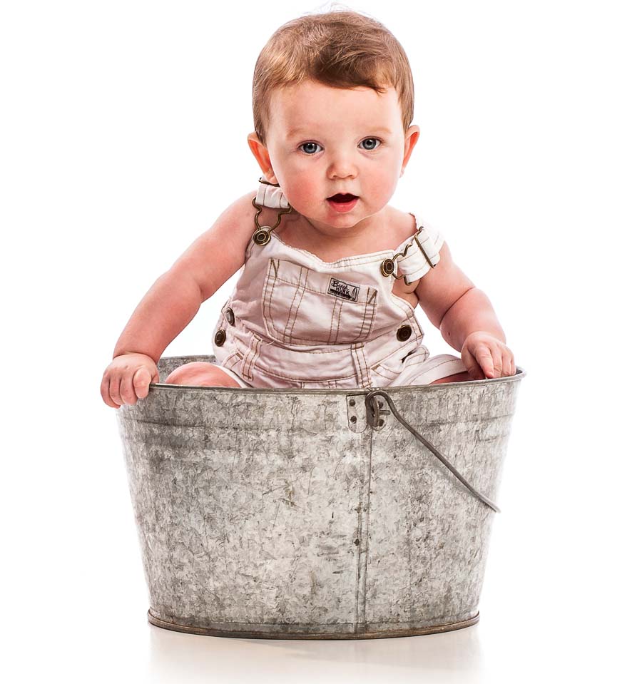 A Fine Art Portrait of a family in the High Fashion White Style