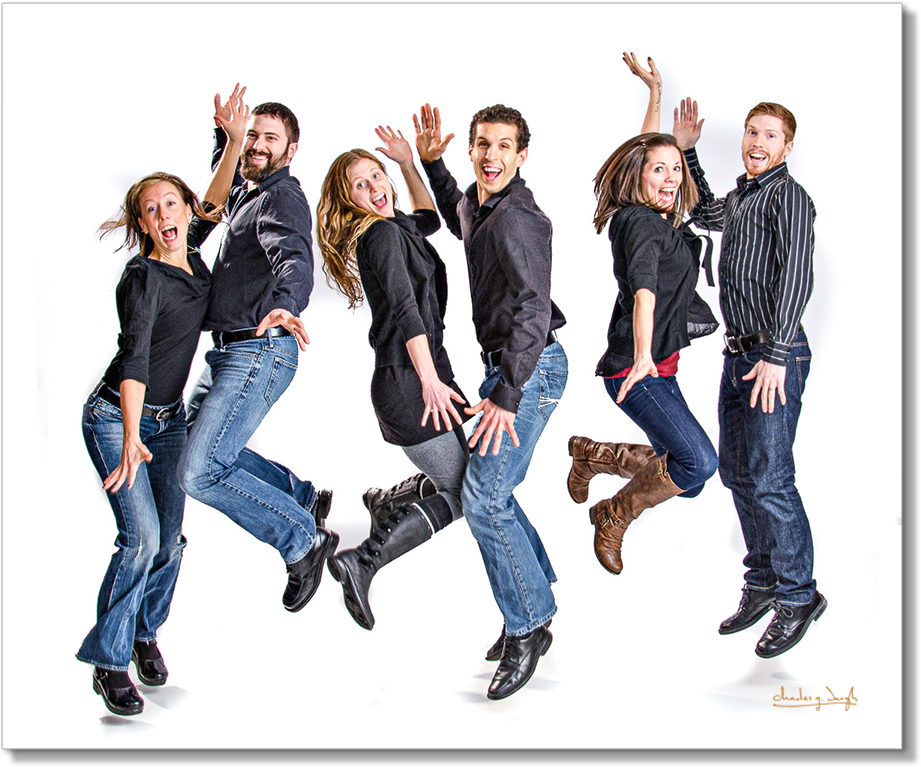 A group of happy people jumping