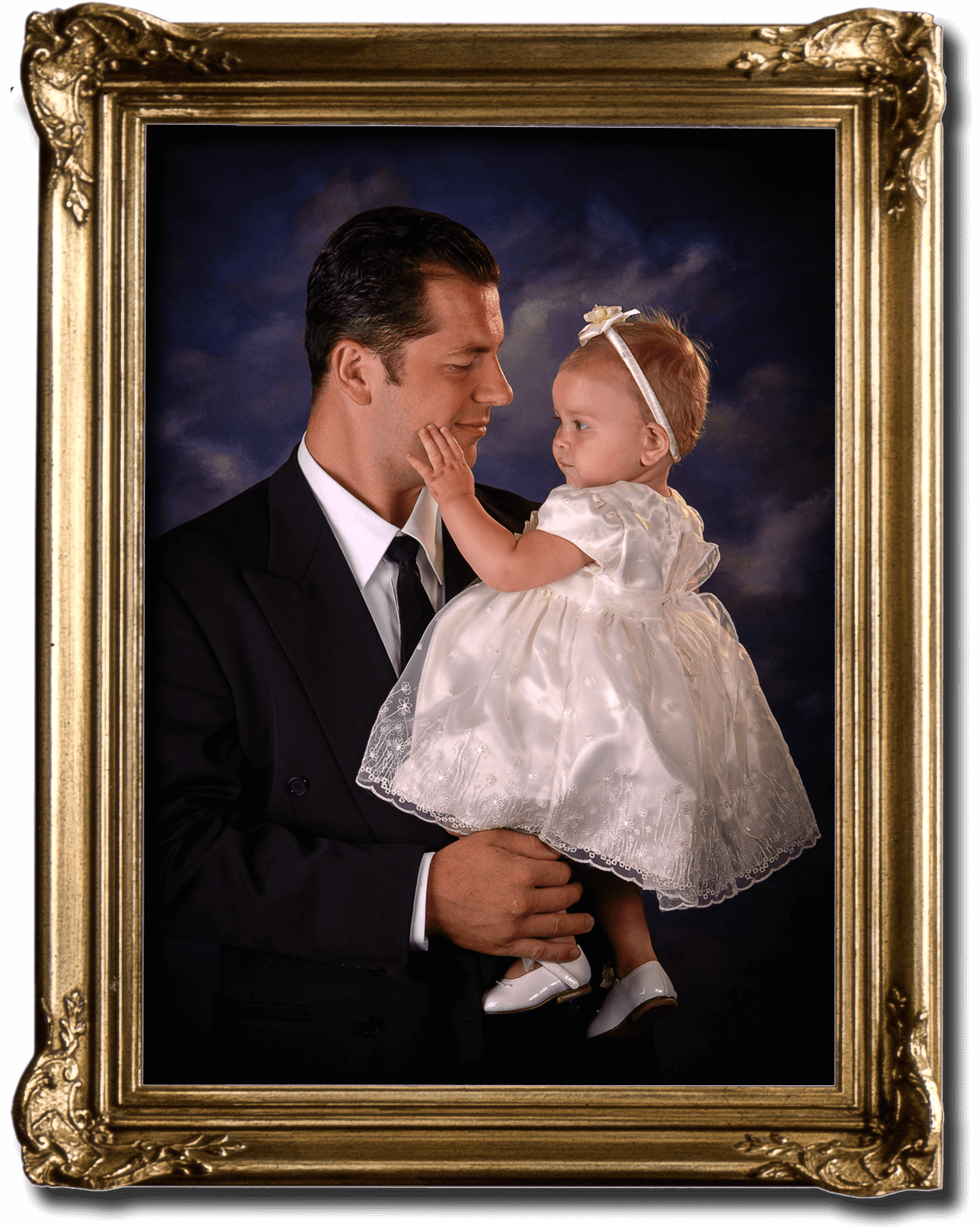 A fine art portrait of a father and his baby girl