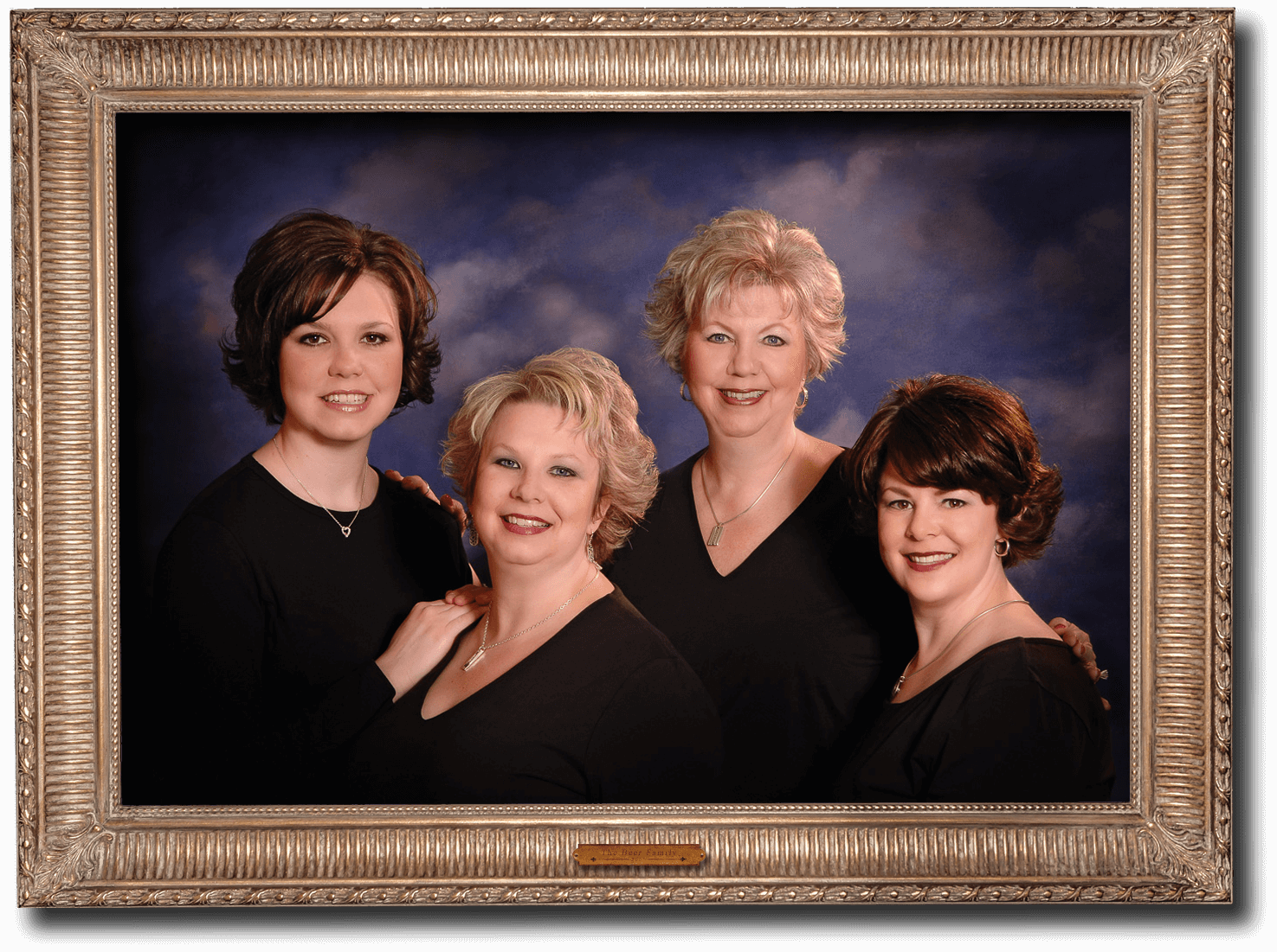 A fine art portrait of a mother and three daughters