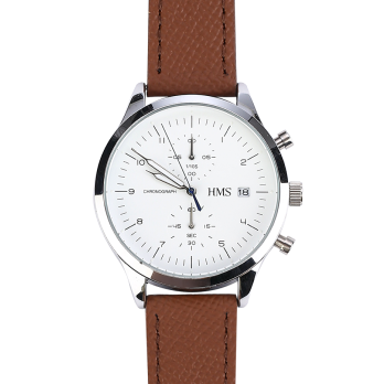 A perfect top-down view of the HMS watch, highlighting the symmetrical design, balanced dial layout, and harmonious proportions that create quiet sophistication