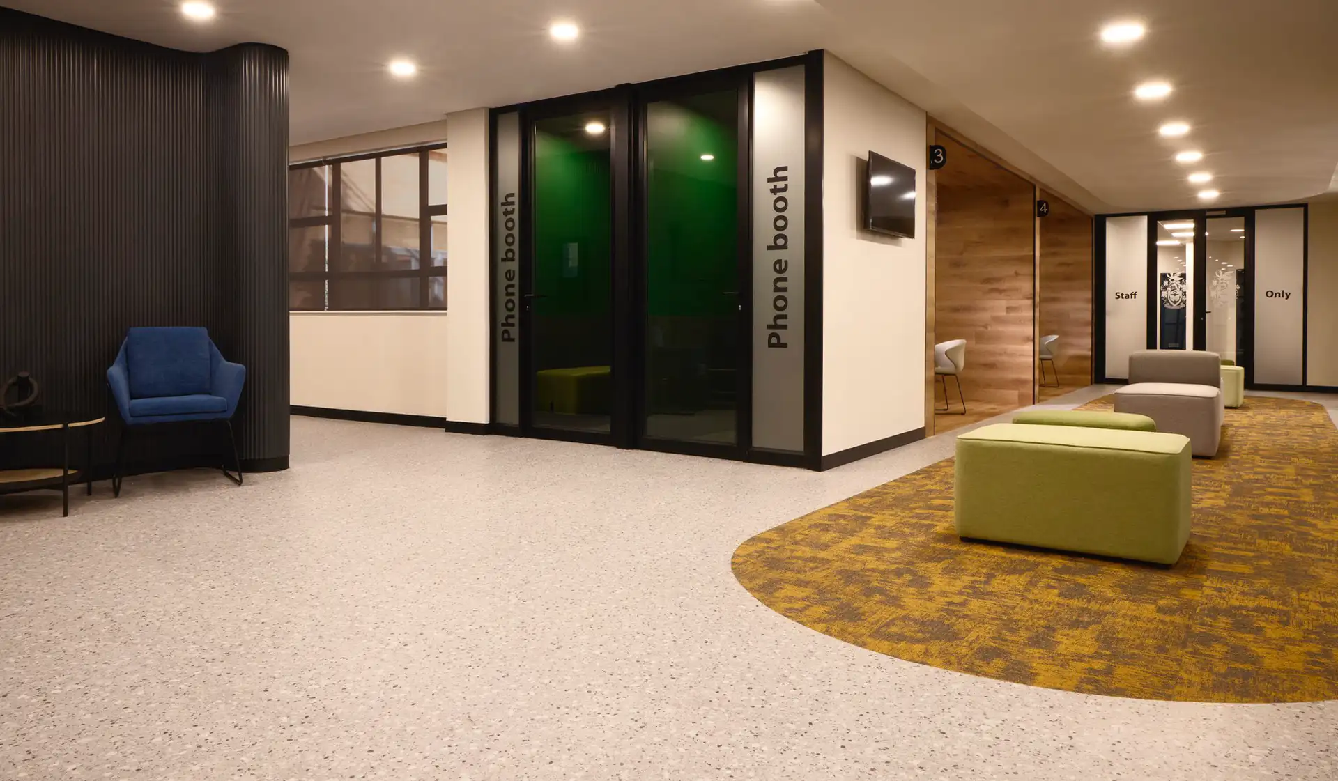 Installation of Hard Graft Shaded - Edge carpet tiles and Aggregate - Sardegna vinyl at the Natal Joint Municipal Pension Building.