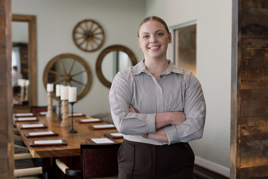 As an 18-year-old, fresh from leaving home for the first time, Faith Waters walked into The Langford at College Station hoping to secure a job she could do for a while as she attended school, first at Blinn College and then at Texas A&M. After spending over 4 years with the residents and team at The Langford, Faith graduated in May of this year and left The Langford in pursuit of her first professional position. She was gone about 4 months when a professional position with the Dining Team at The Langford opened. Faith was approached about the opportunity and just recently has returned as the Dining Room Manager. 