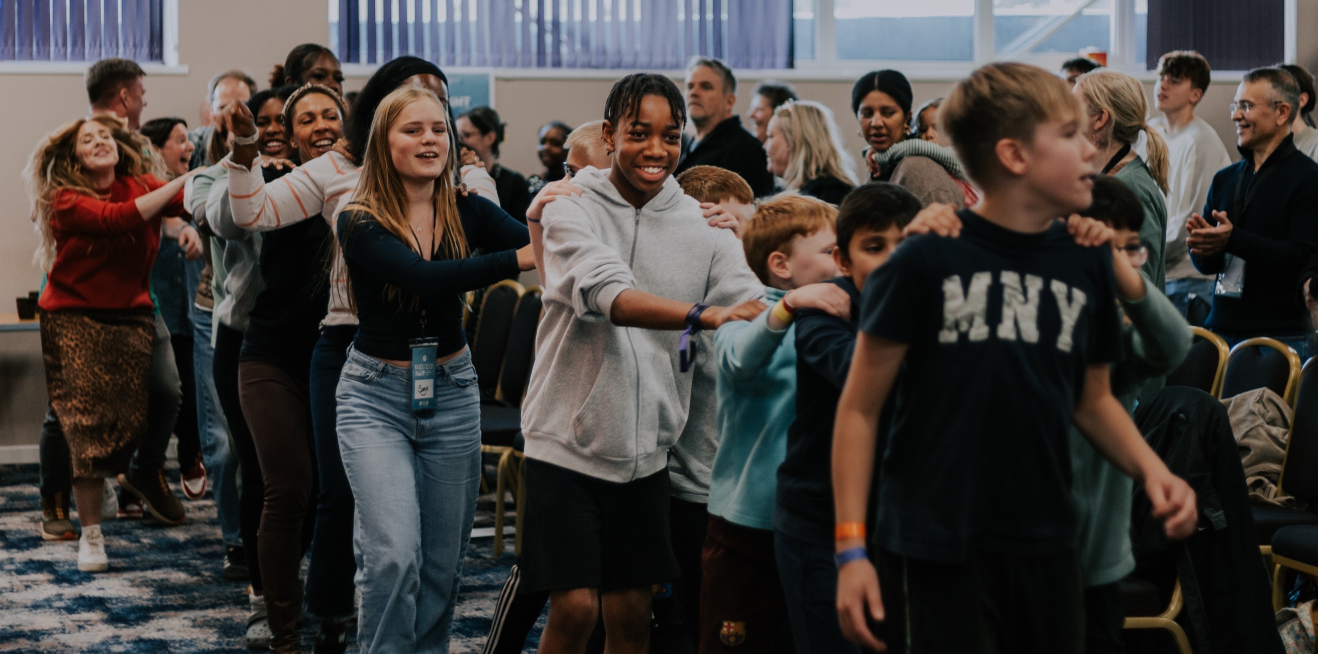 Ivy Church congregation dancing together during a Sunday gathering