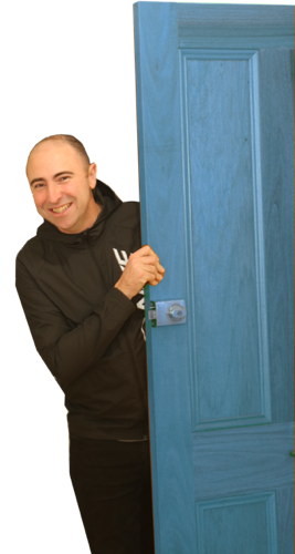 luke marshall entering through a blue door