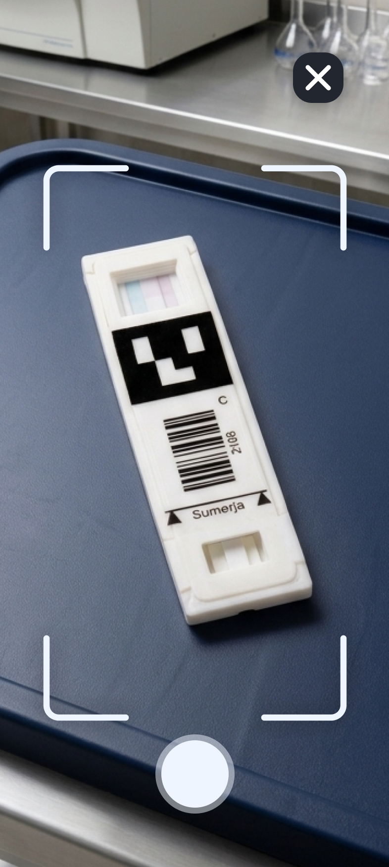 Camera screen for photographing a completed medication test strip.