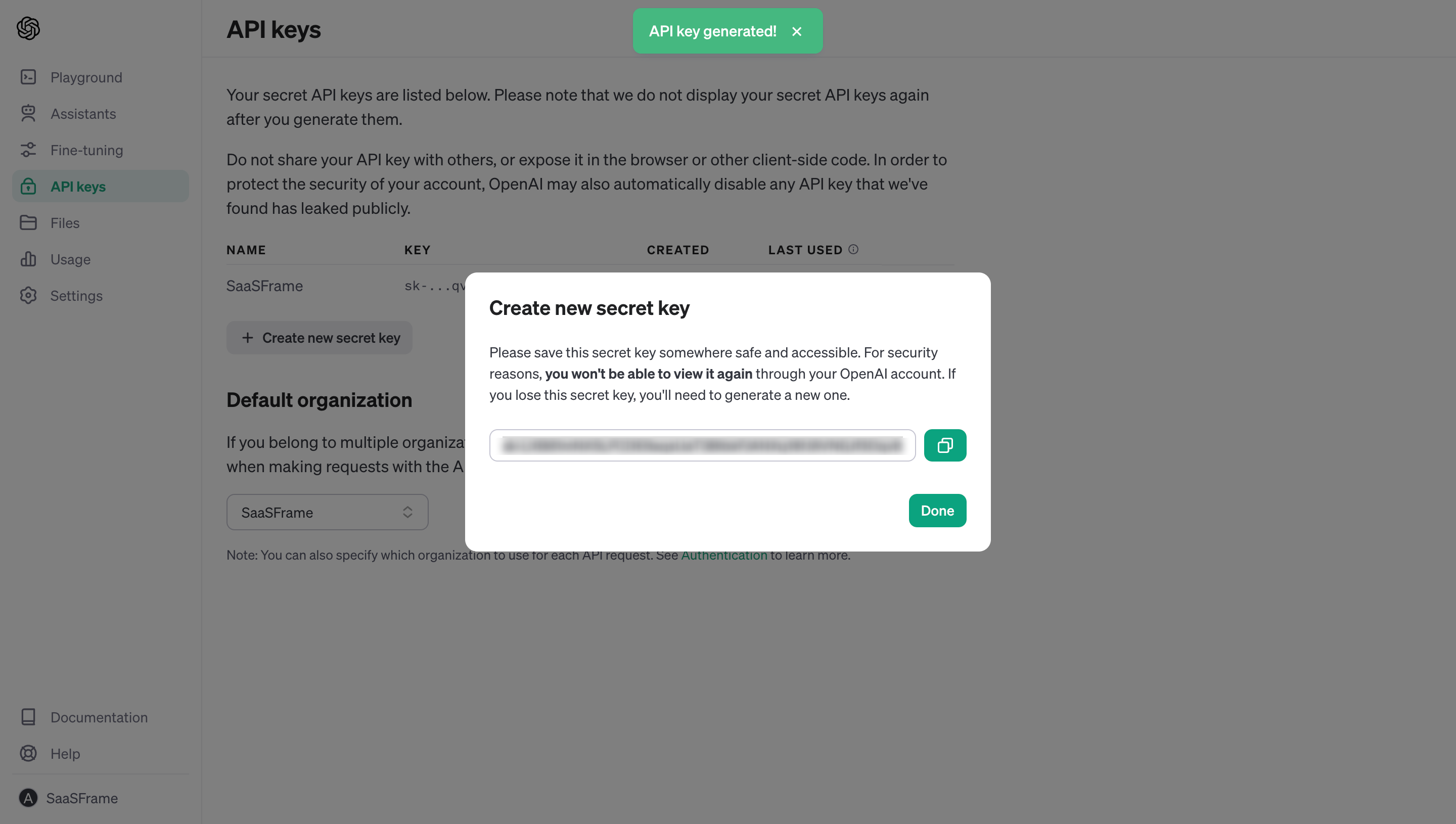 Archived OpenAI API-key creation modal with a copy control and instructions that the secret cannot be viewed again
