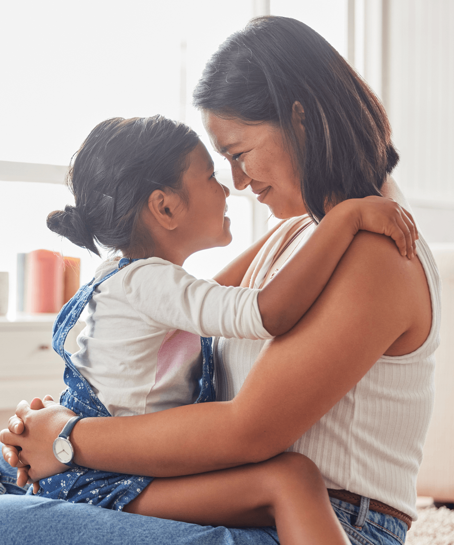 A parent holding a child