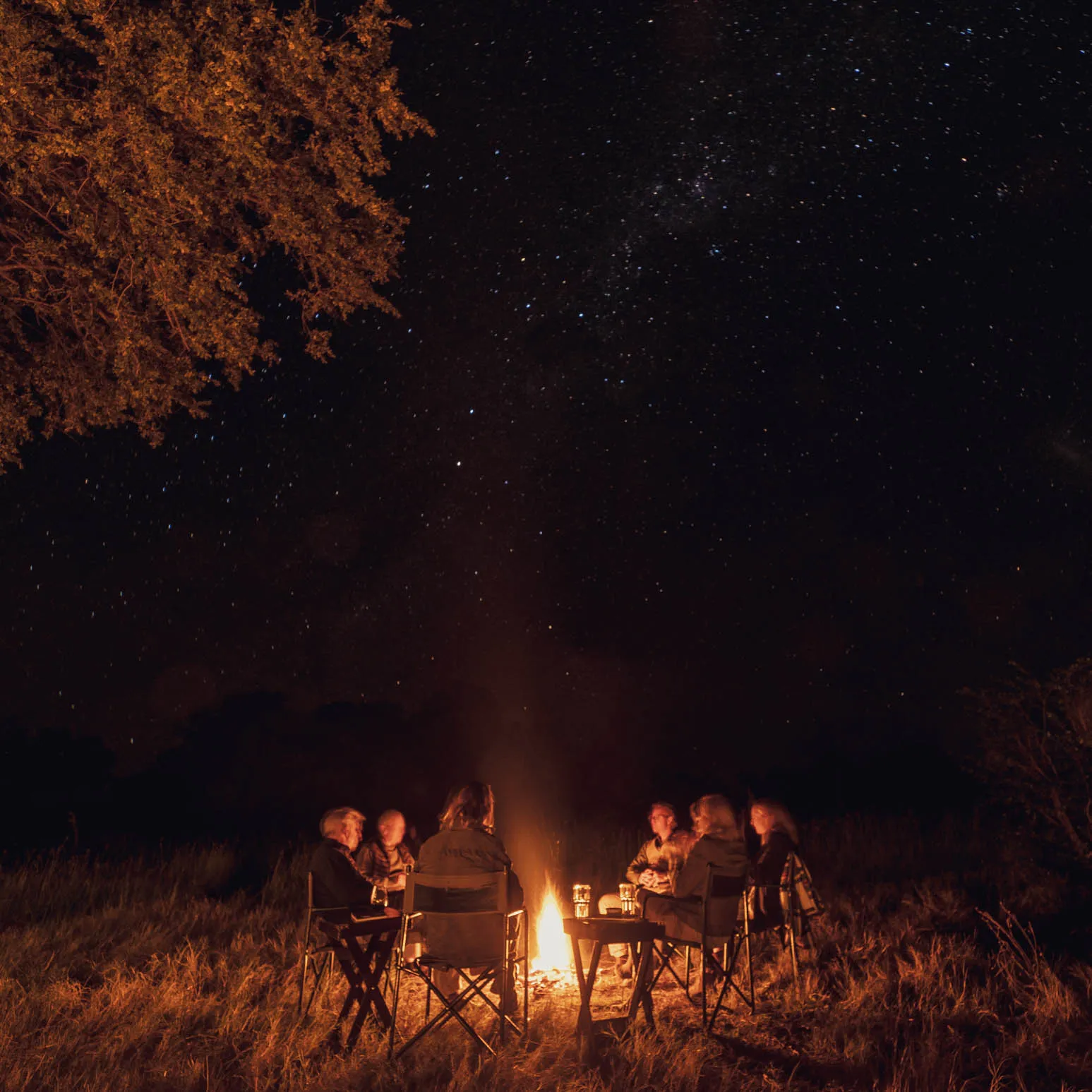 The perfect way to end the day: a campfire in one of Africa's last wildernesses © Barclay Stenner