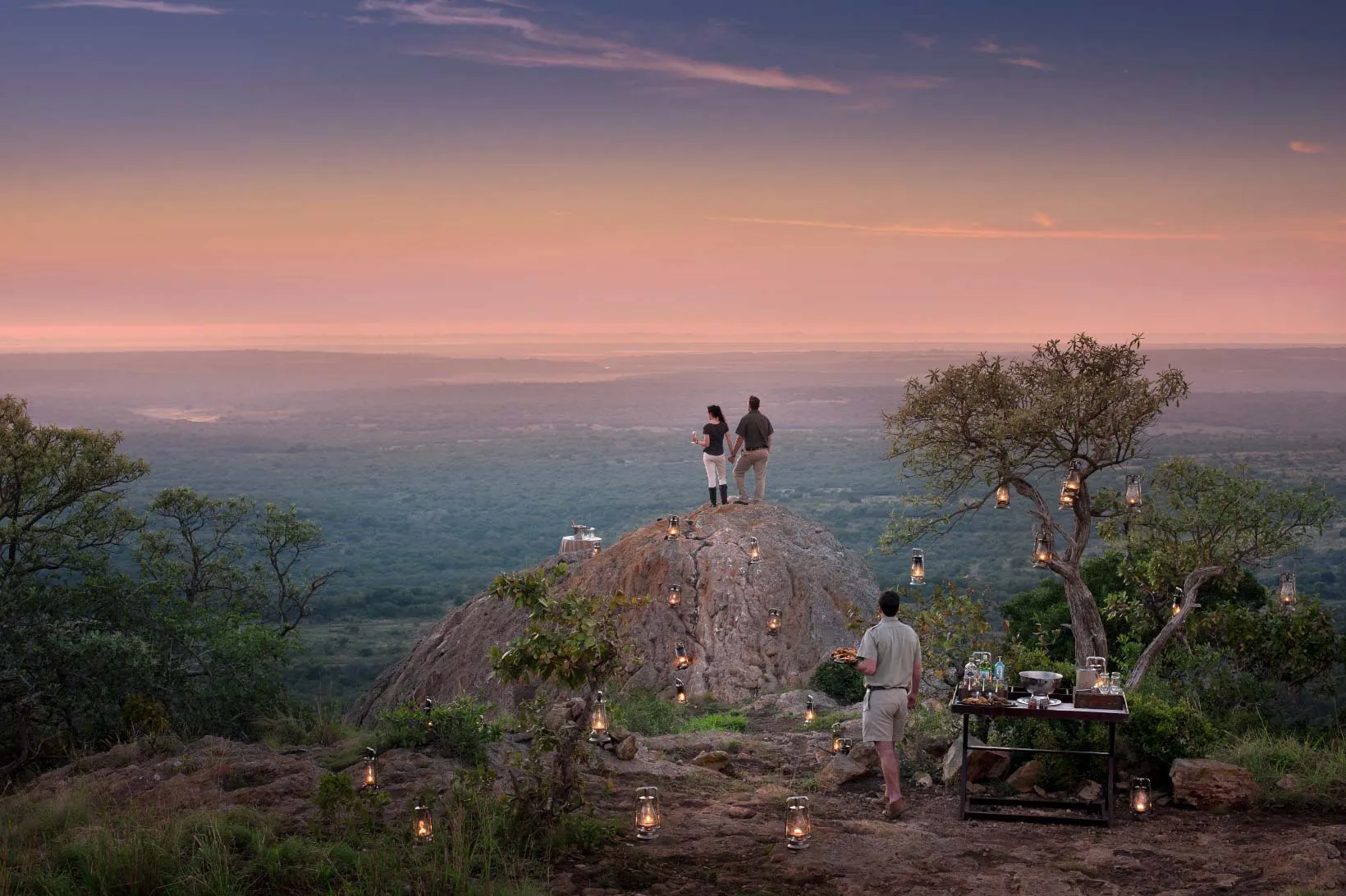 Expansive views at Phinda Private Game Reserve during a sundowner drinks stop on safari.