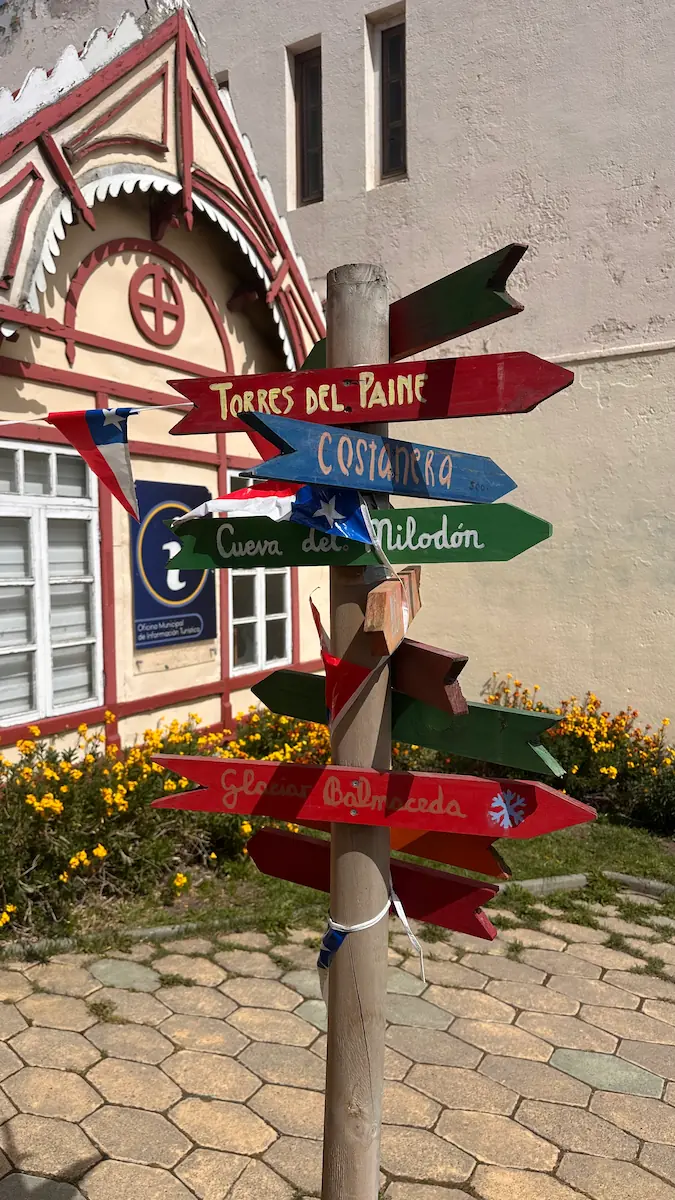 Signpost indicating different directions in Torres del Paine, Chile