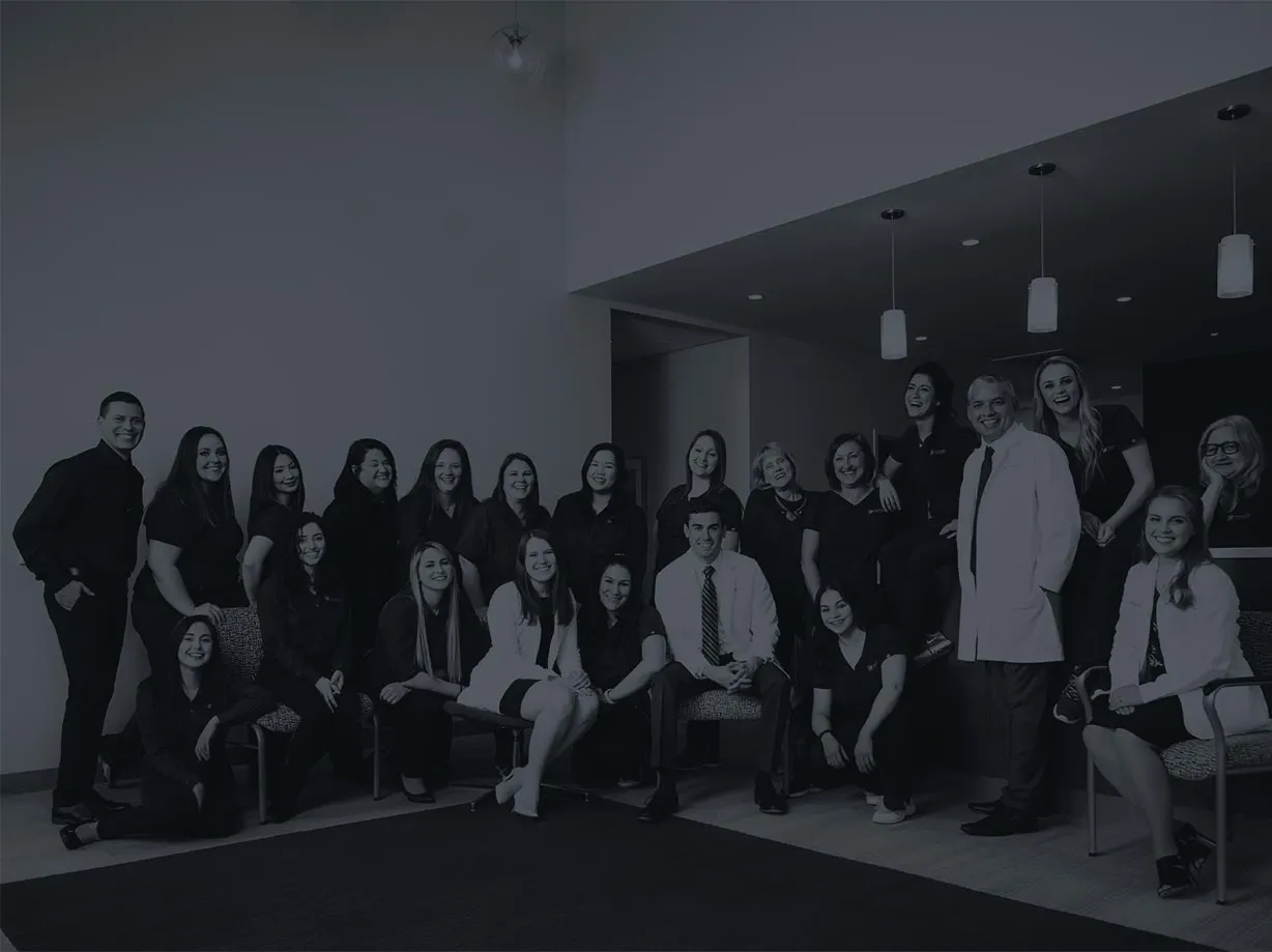 Photo of a group dental practice team