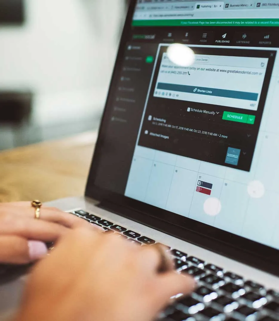 Photo of a person using a laptop computer