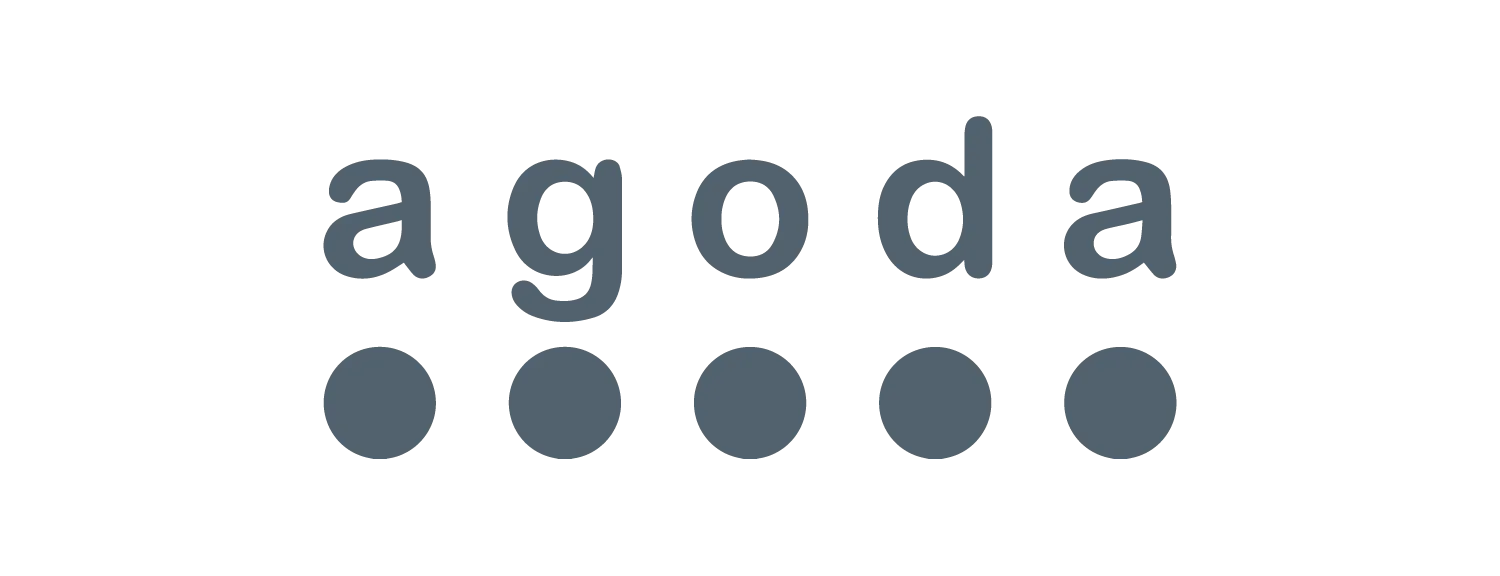 Agoda logo in black and white, featuring the company name and five dots. Ideal for brand recognition.