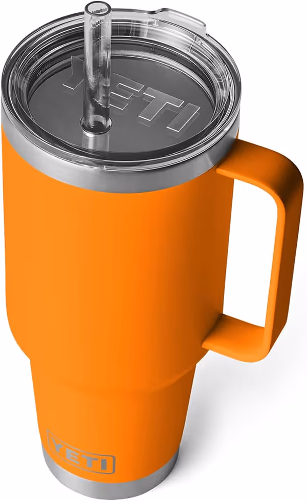 An orange Yeti Rambler tumbler, showcasing its durable design and vibrant color, perfect for outdoor adventures.