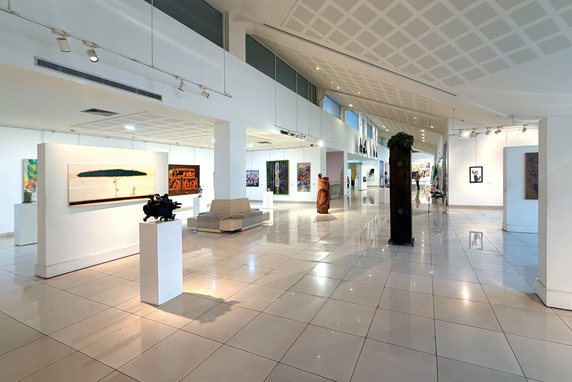 Paintings and sculptures across the gallery at Art Leaves Its Mark, 2026. Photograph by Khaled Barakeh.