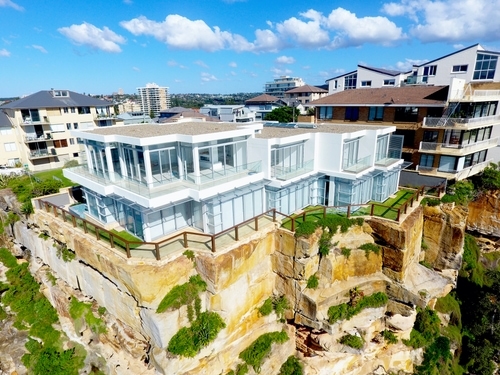 Freshly renderer white mansion on top of the cliff
