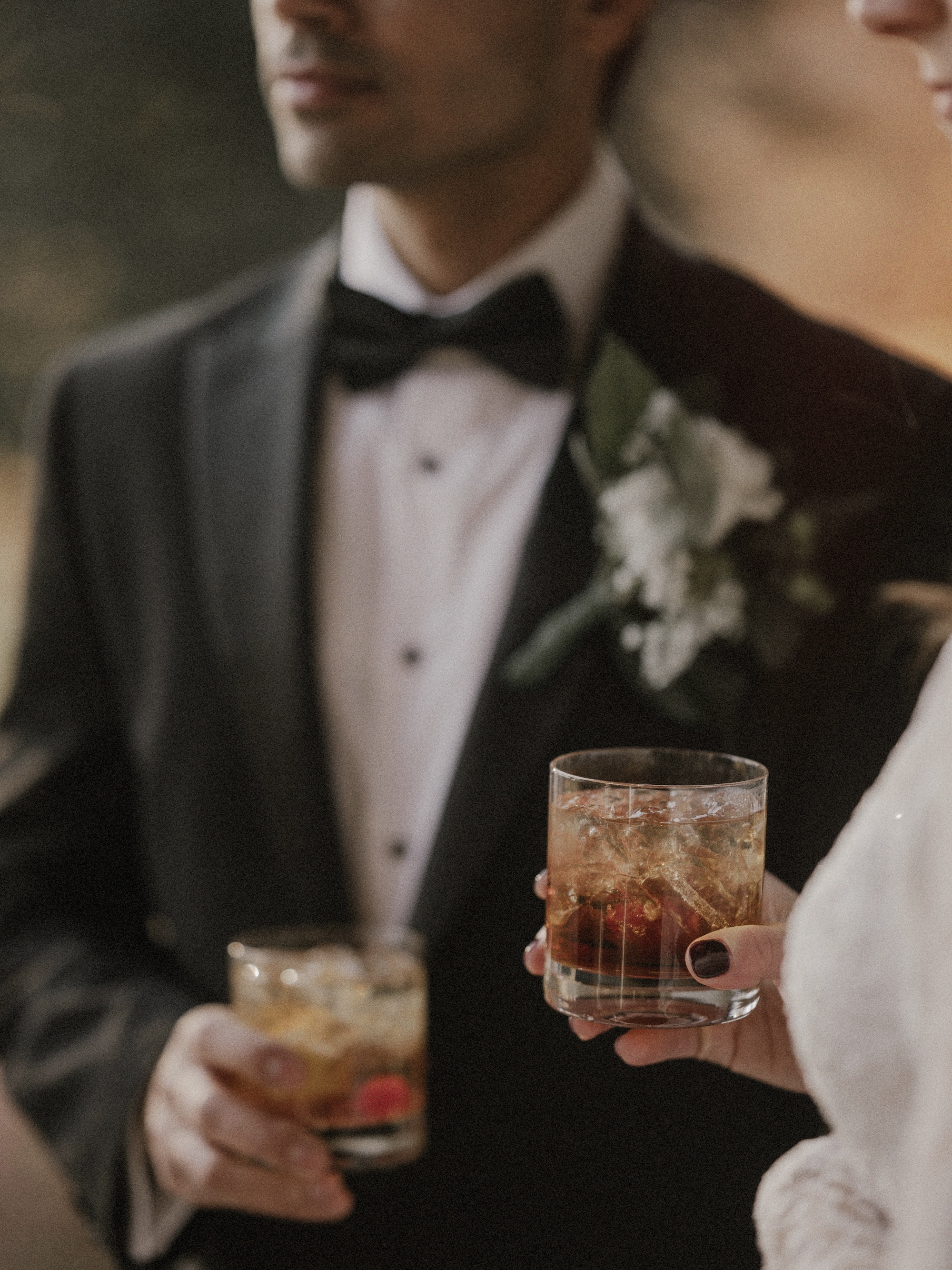 Bride holding drink for wedding at Portico Awbury cocktail hour