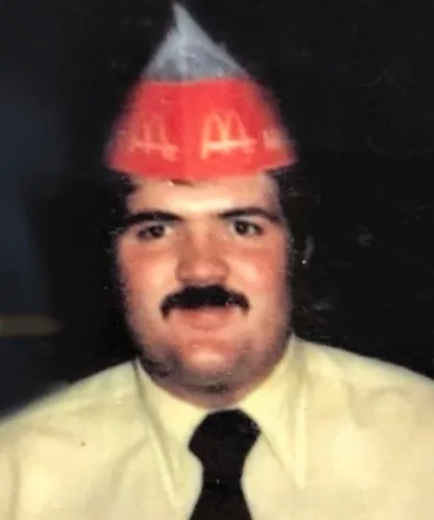 old photo of mike working at mcdonalds