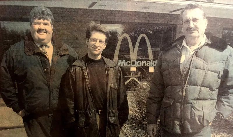 old photo of mike in front of mcdonalds