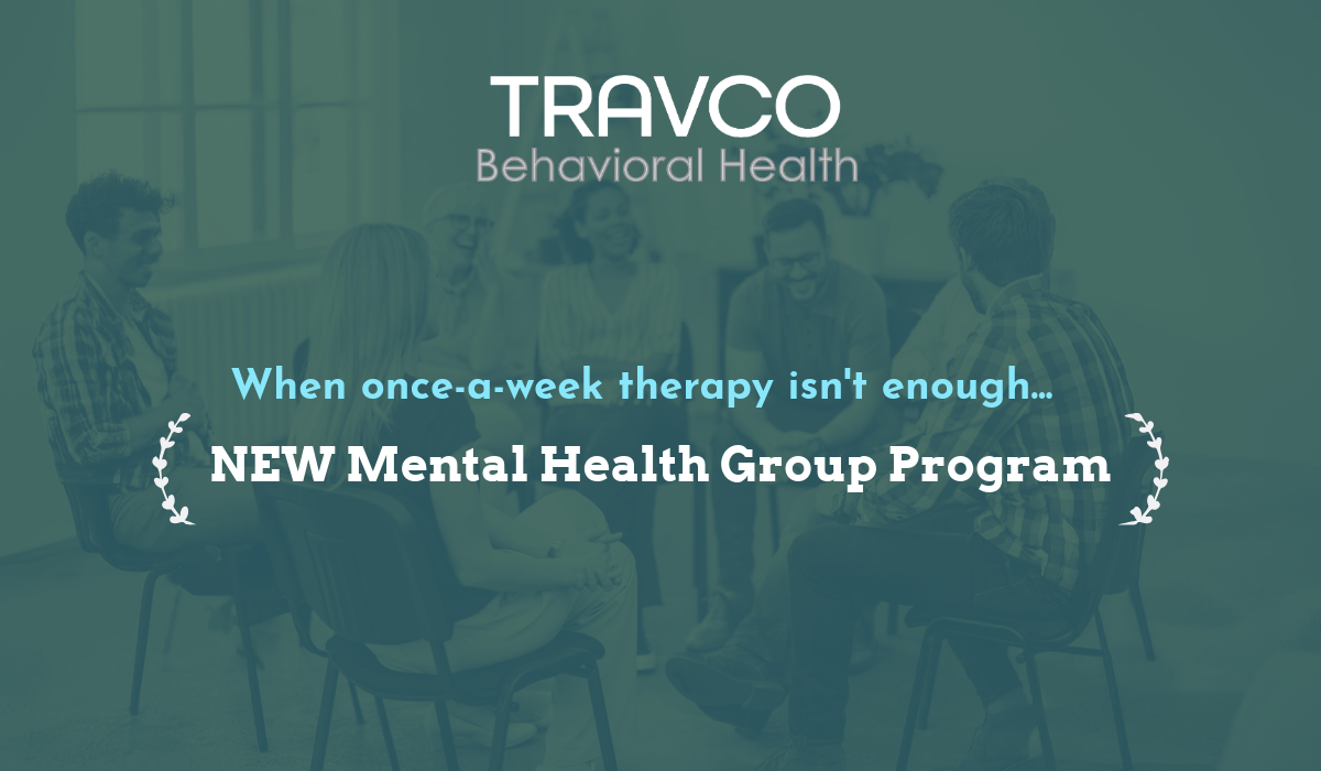 Small group of men and women sitting in chairs and talking