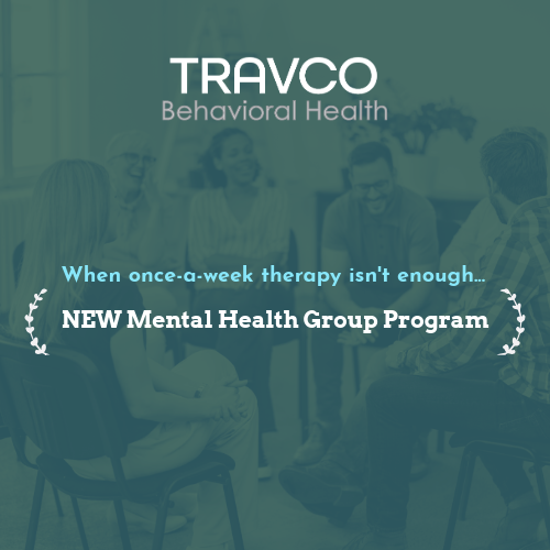 Small group of men and women sitting in chairs and talking