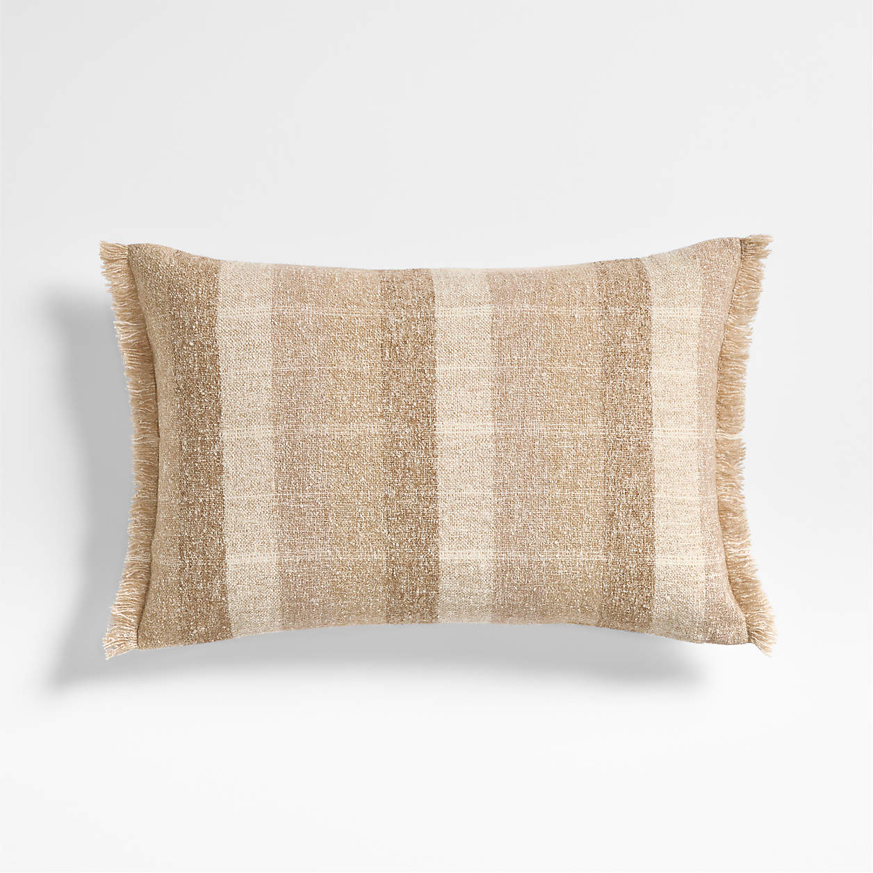 Rectangular beige and cream striped throw pillow with fringed edges on a white background.