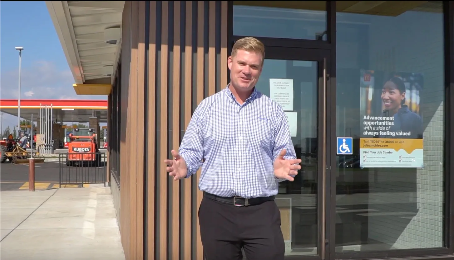 mike speaking to camera