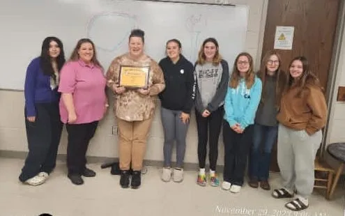 mike speaking to camera