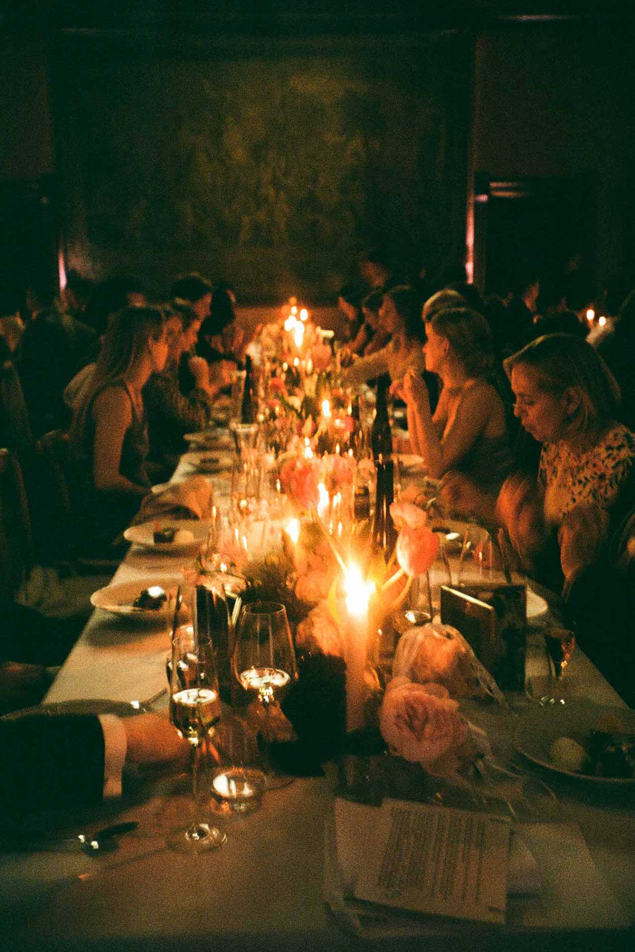 Cosy table decor at wedding in London, captured on 35mm film by Cheshire Wedding Photographers Paul and Nanda.