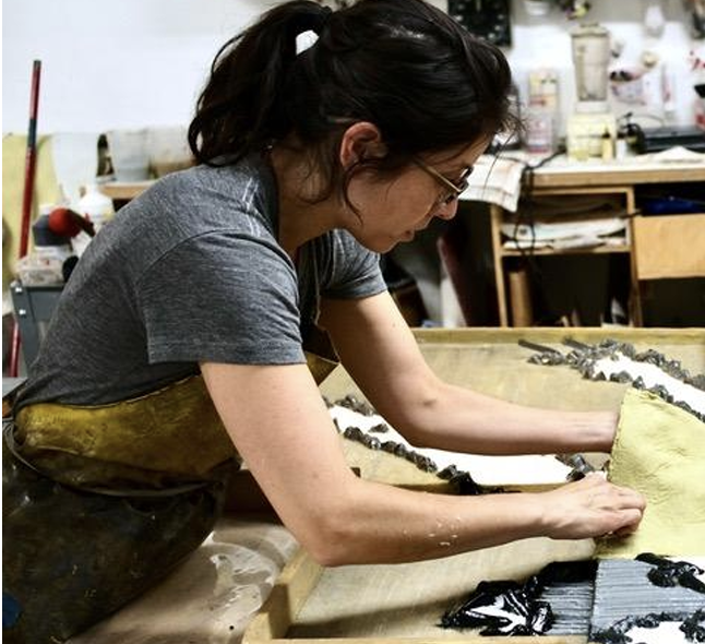 a photo of Akemi Martin making paper