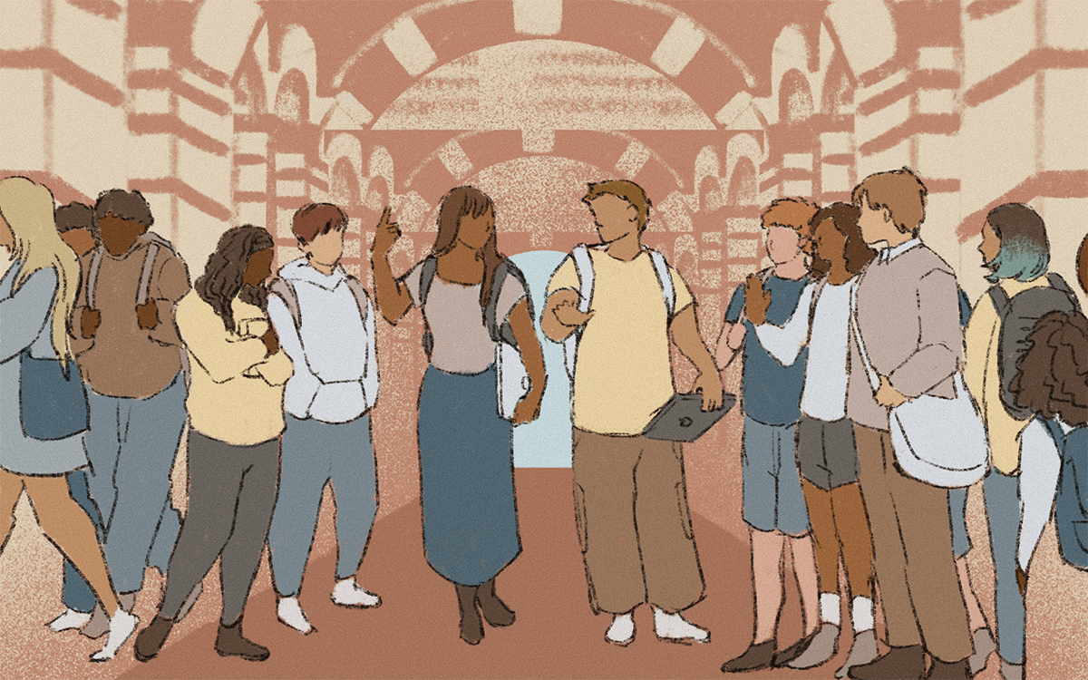 a group of people walking the halls of what appears to be a school
