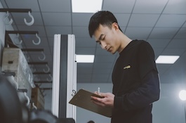 Logistics worker looking at a clipboard