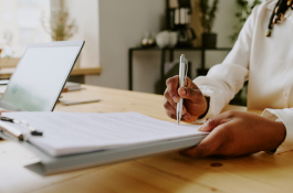 Person signing a contract