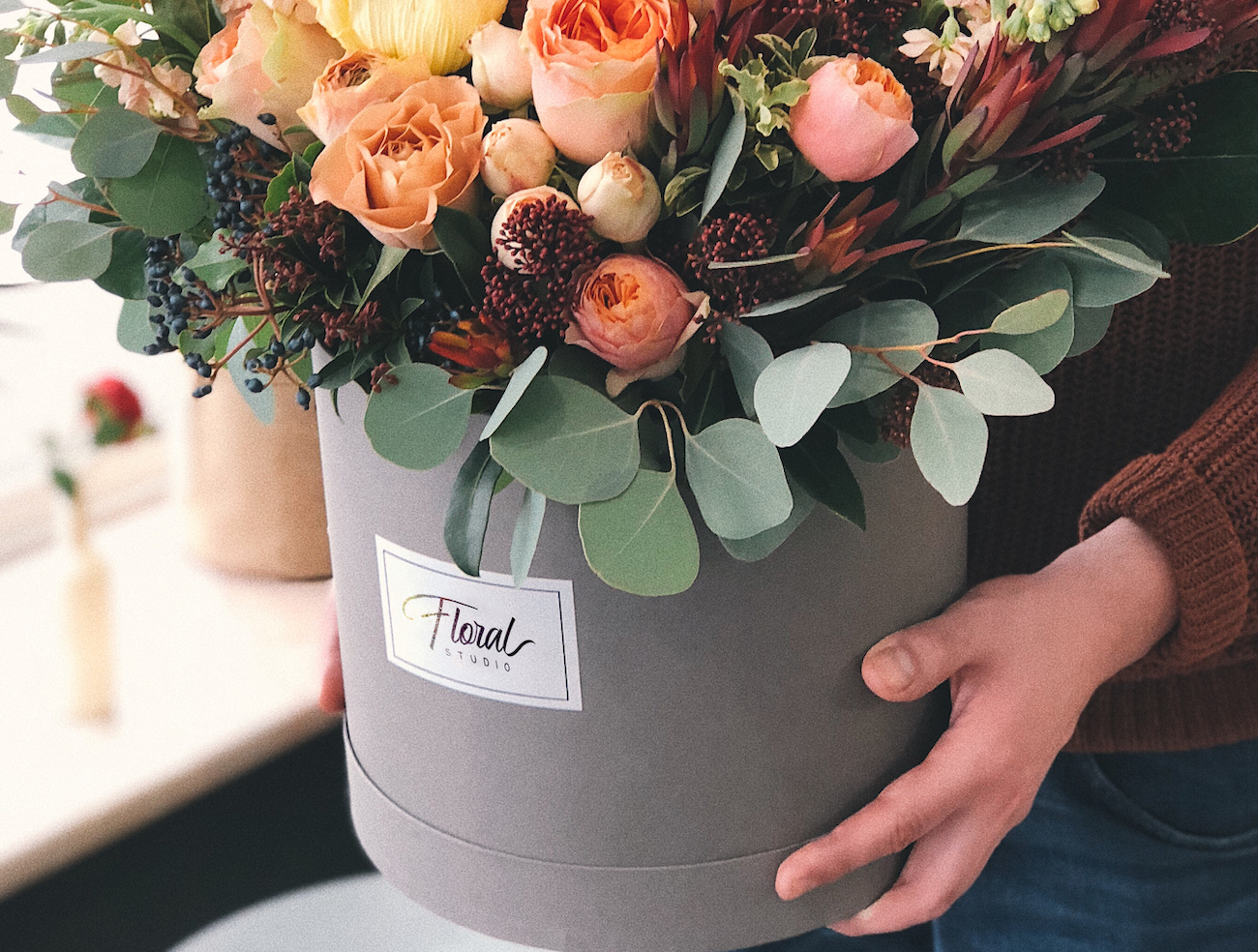 Fresh Flowers in a Round Box is out for delivery in Downtown New York.