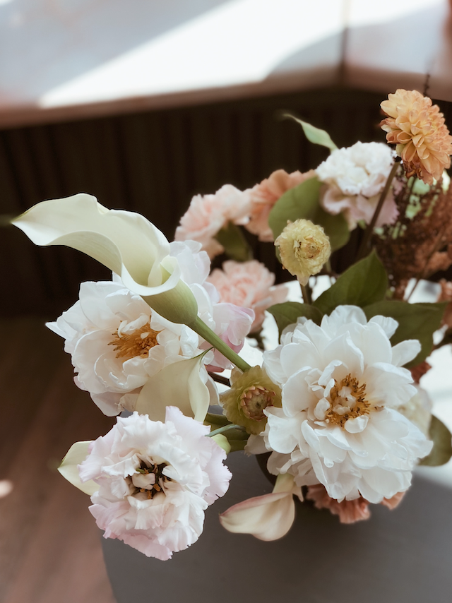 Holiday floral decorations arranged for entertaining at home