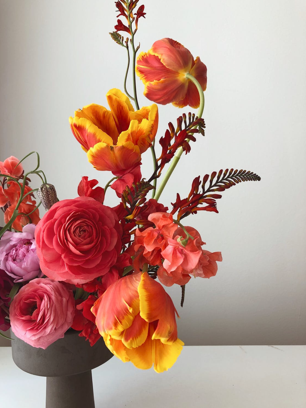 Fresh flowers used to welcome clients at a Wall Street office