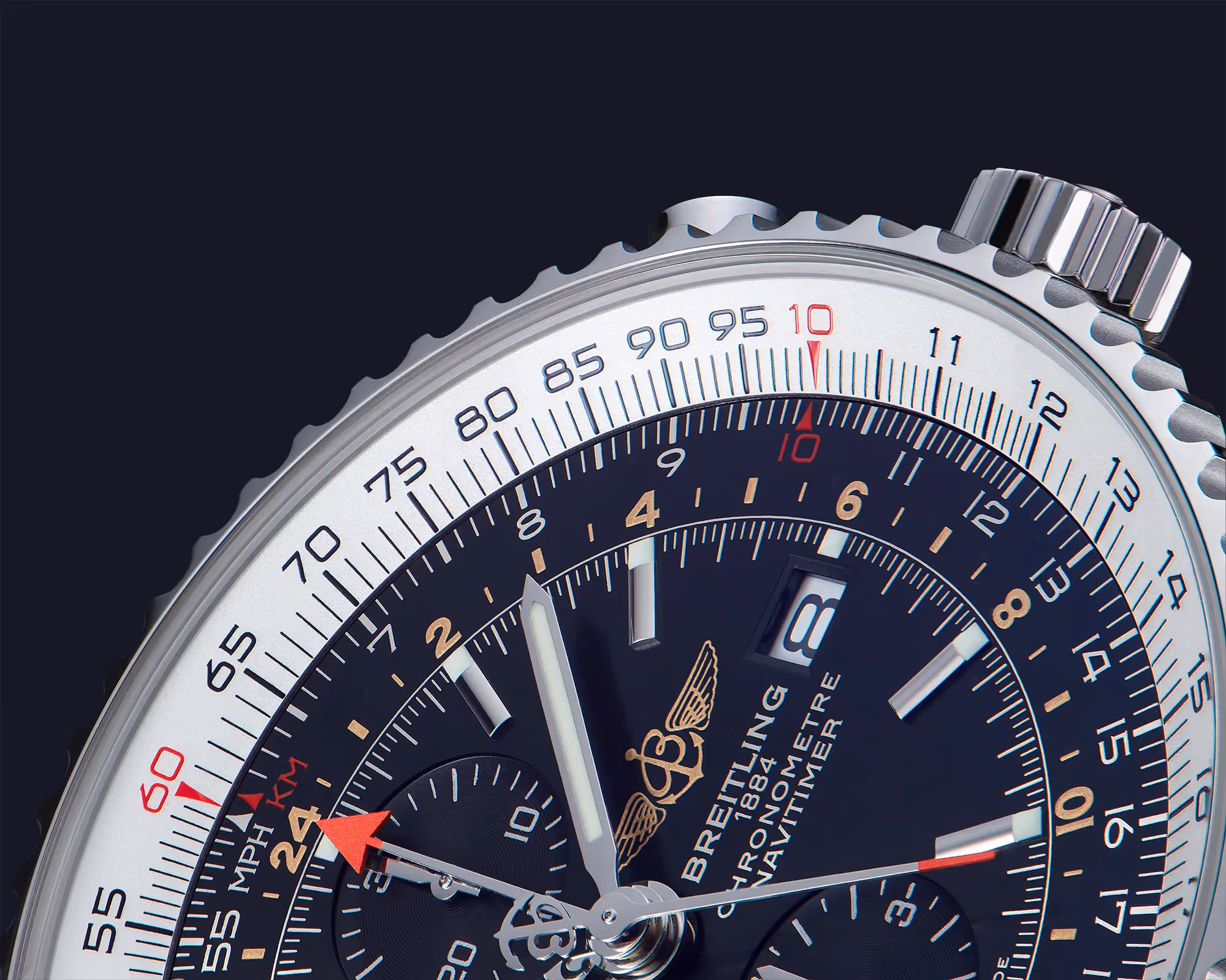 macrophotographie du cadran et des aiguilles d'une montre breitling