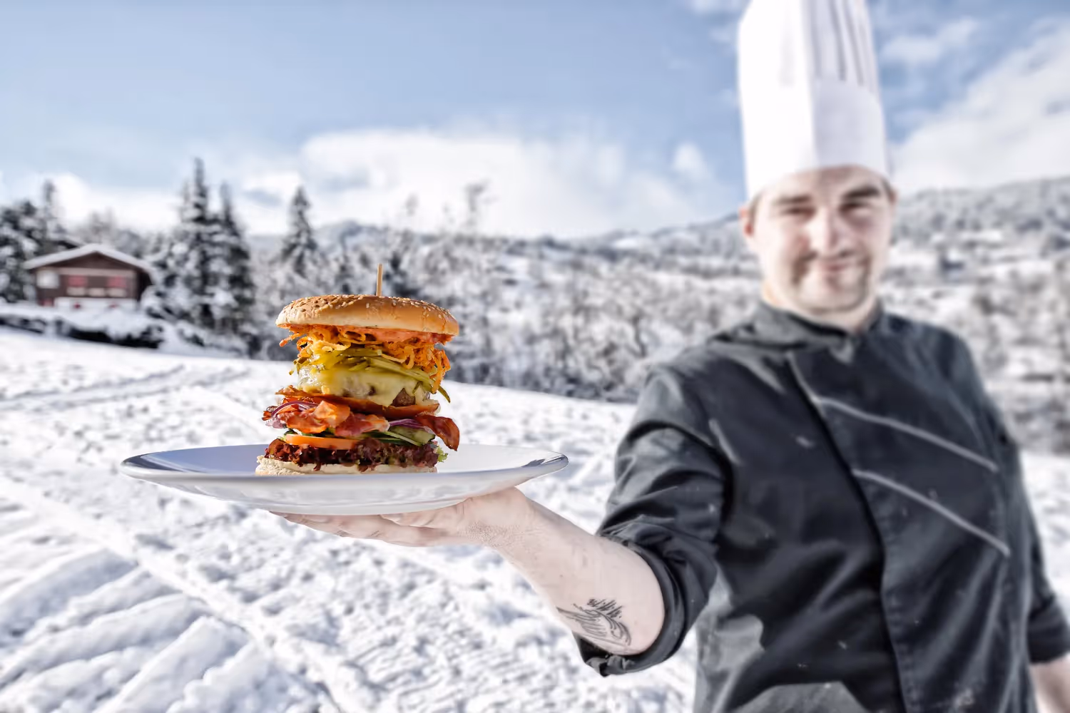 Un burger géant vous attend au restaurant de l'Aspen à Grindelwald