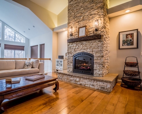 A fireplace and atrium remodel, opting for a rustic look with a modern twist.