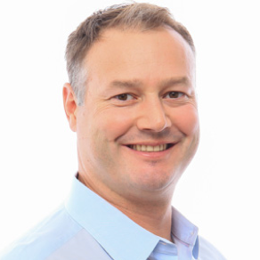 Portrait photograph of CFO Andrew Johnson, MBA