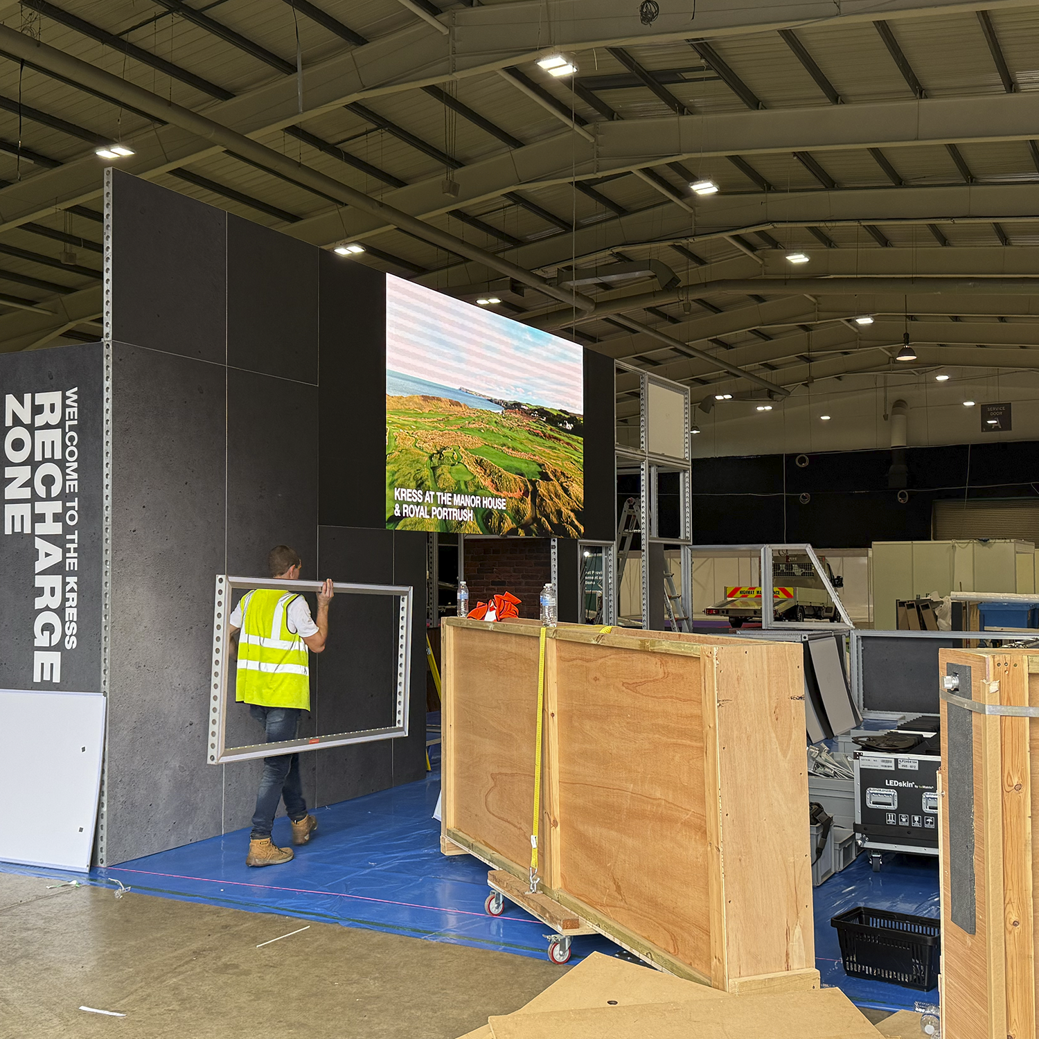 The large LED video wall created including a 3d rendered animorphic view of a Kress RTK mower, built and installed on the indoor Kress stand at Groundsfest 2025
