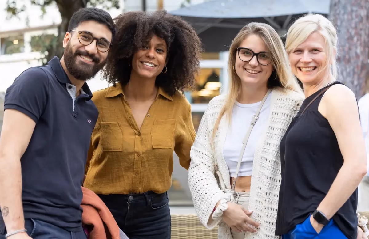 Group of people smiling at camera