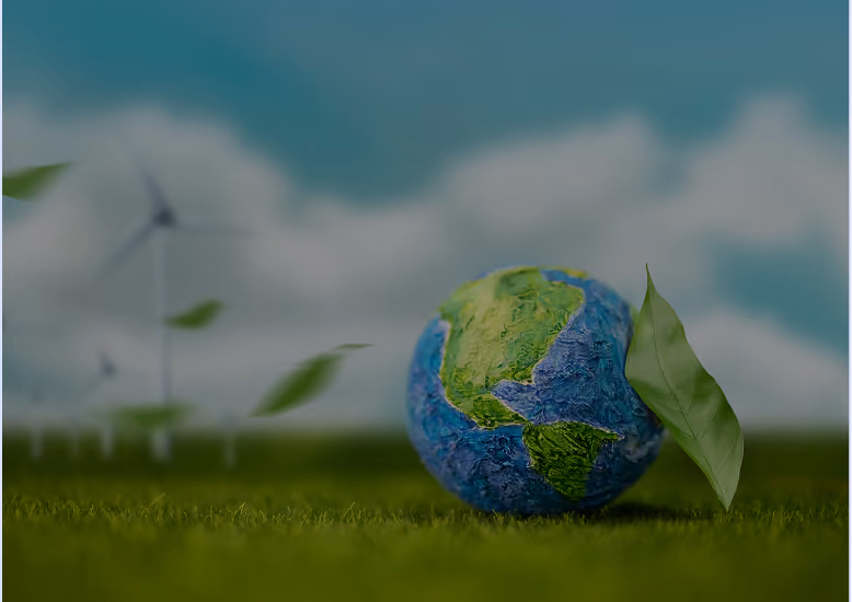 Globo terrestre sull'erba, simbolo di sostenibilità