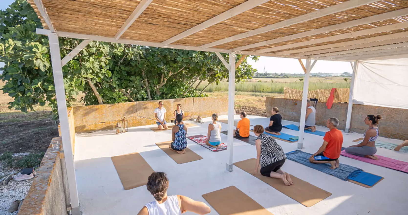 Persone durante una classe di Yoga