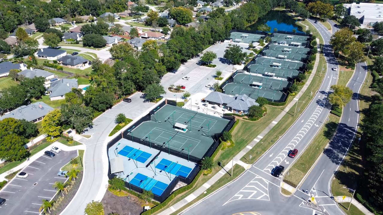 Multiple tennis courts from aerial view