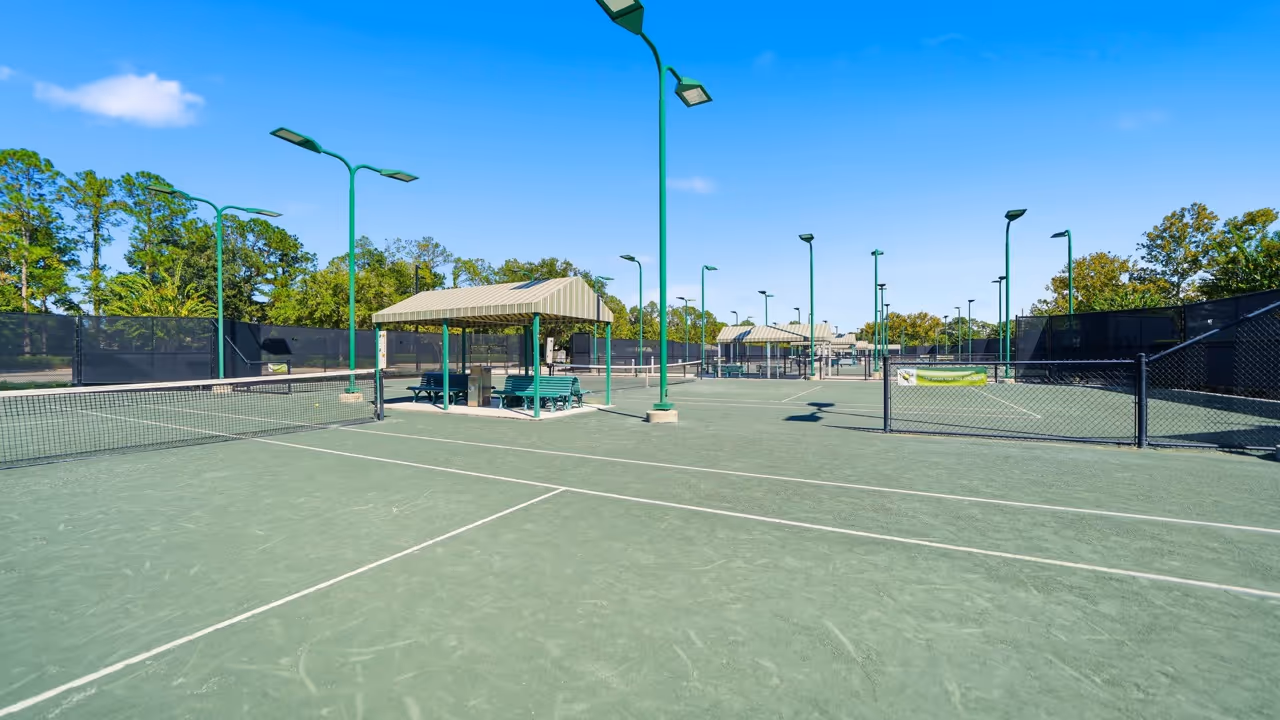 Tennis courts with pavilion seating areas